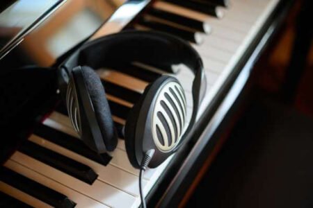 headphones on the piano